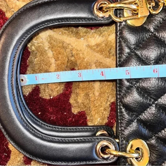 St. John Women's Black Leather Quilted Handbag
Purse Gold Tone hardware W/ Charm - Picture 15 of 16